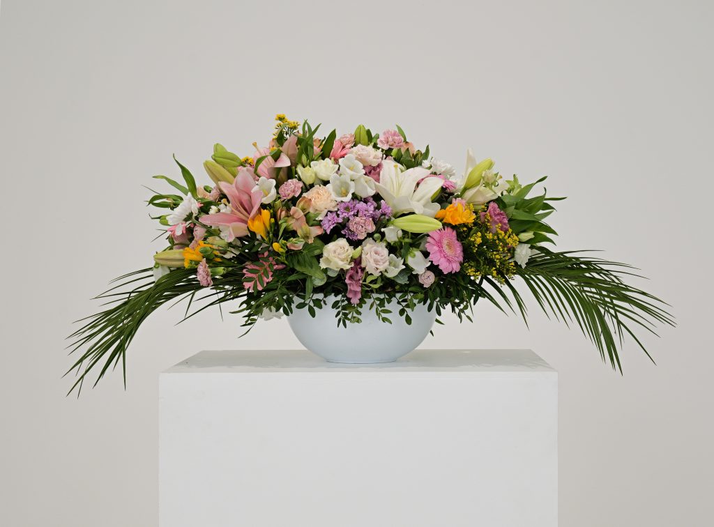 Kapwani Kiwanga, Flowers for Africa : Cameroon, 2020, Instructions for creating and presenting a floral arrangement using an archival image to guide the recreation of a floral arrangement composed of cut flowers, Variable dimensions