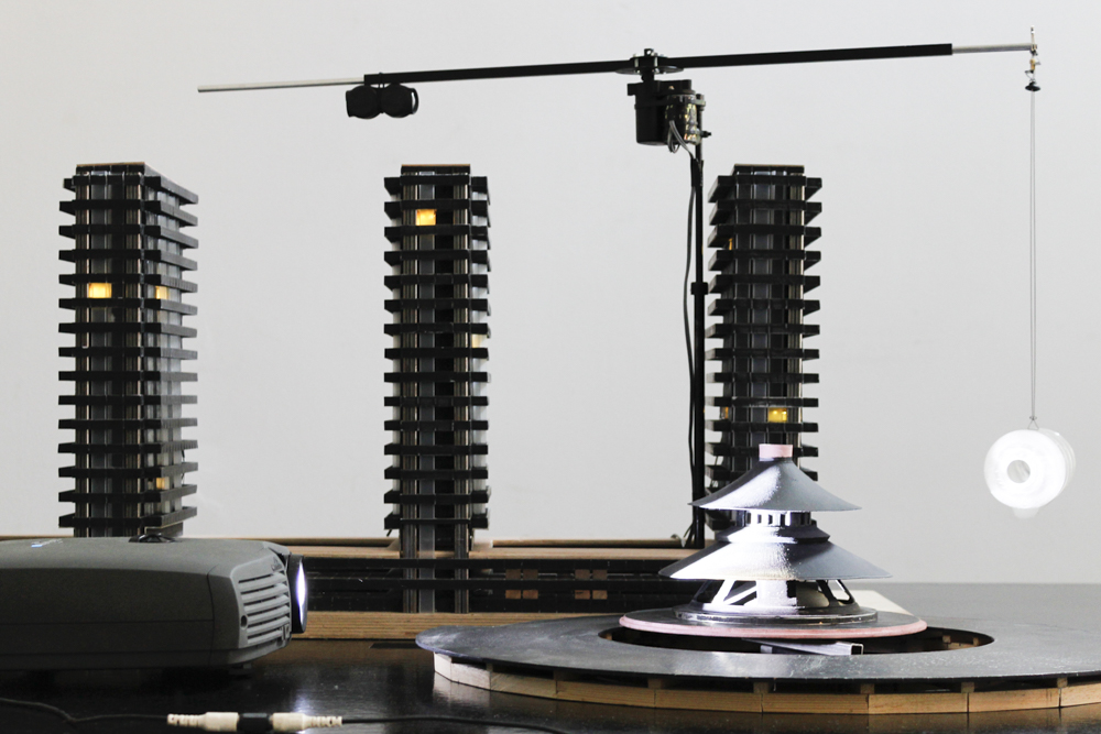 Bertrand Lamarche, The Model, 2019, Model, mixed materials, cables, LED, projector