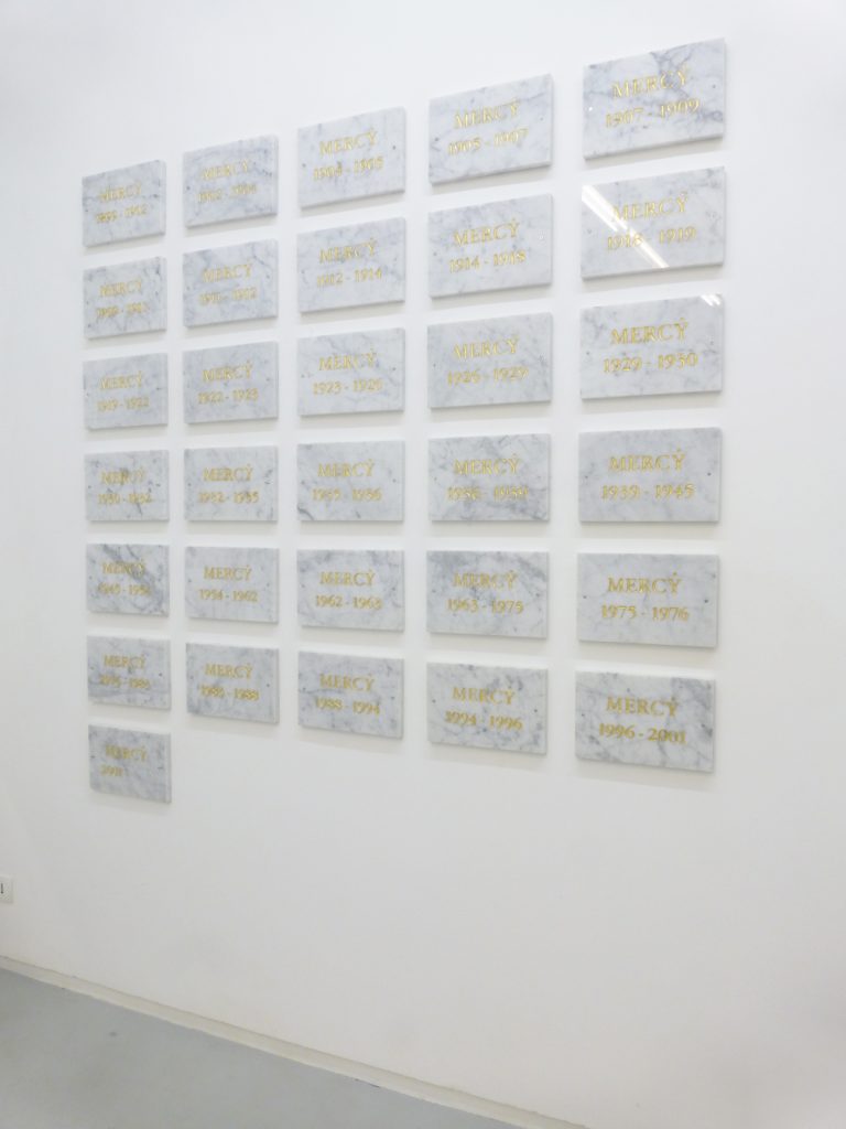 Société Réaliste, Mercy, 2012, 31 engraved and gilded white marble plaques, 30 x 23 cm each