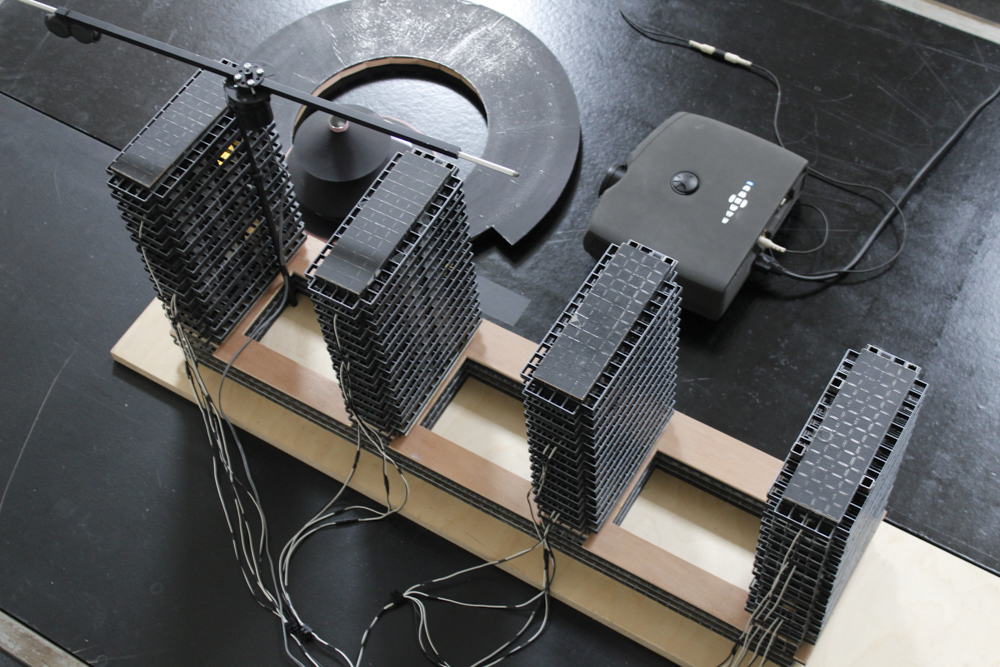 Bertrand Lamarche, The Model, 2019, Model, mixed materials, cables, LED, projector