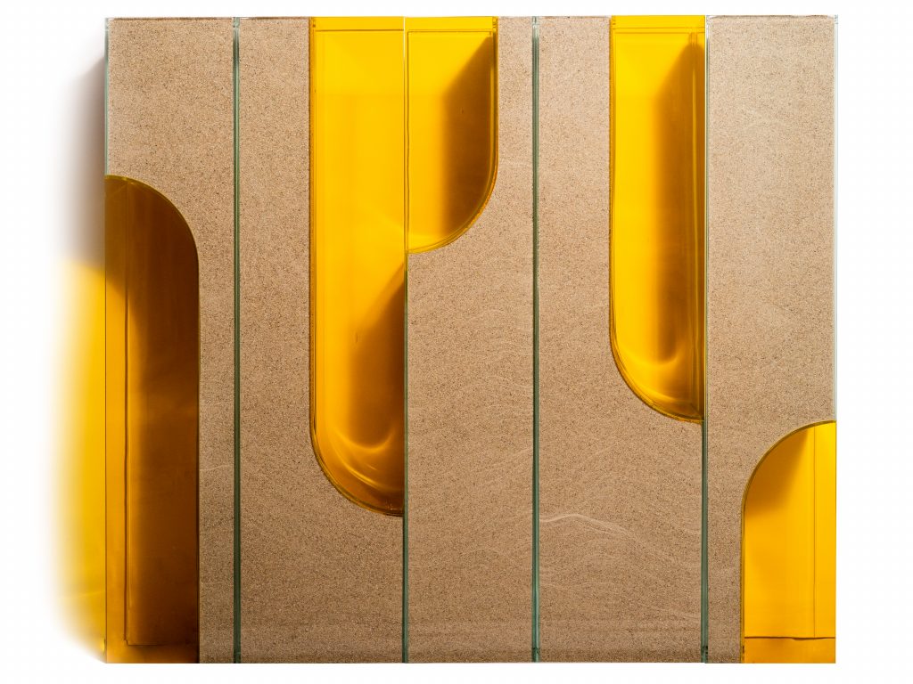 Kapwani Kiwanga, Shifting Sands (yellow), 2023, Glass, blown colored glass, silica sand, 70 x 80 x 15 cm, Edition of 3 plus 2 artist's proofs