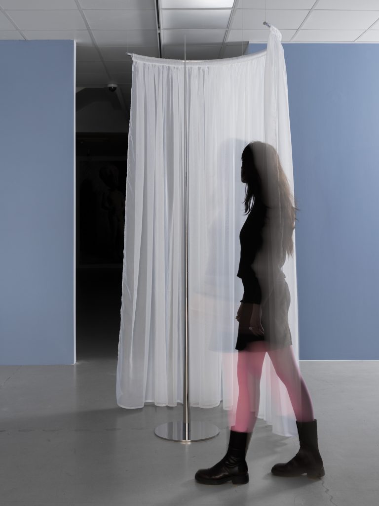 Nikita Kadan, Tryvoha II, 2025, Stainless steel, curtain, speakers, 230 x 100 x 100 cm